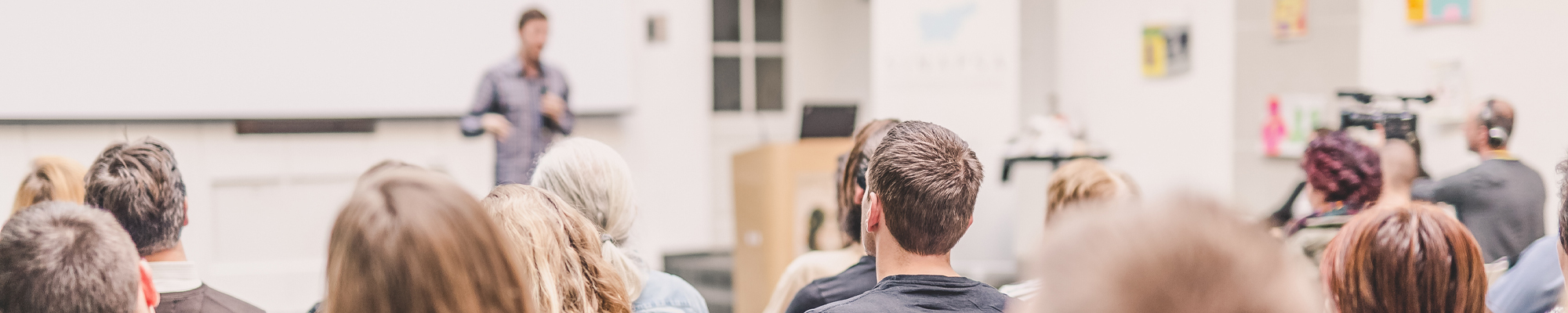 audience and speaker at an event