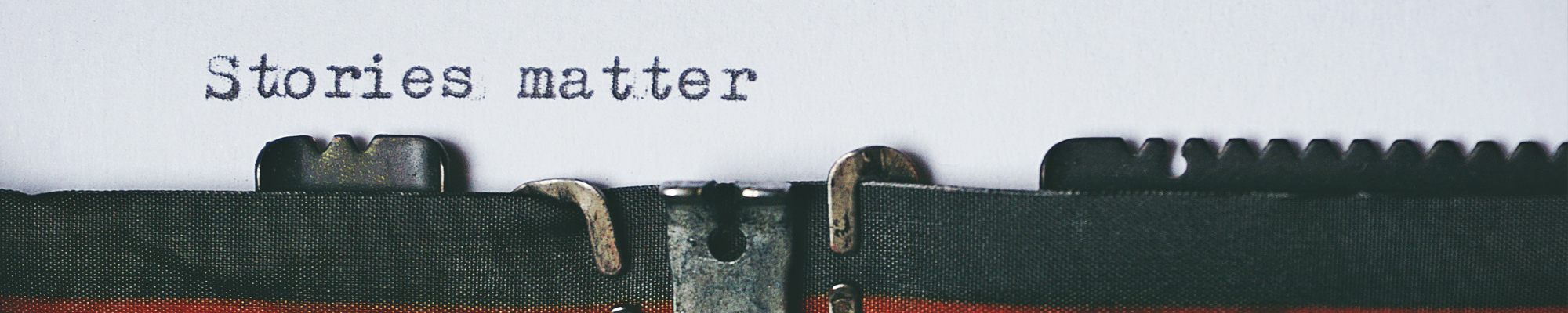 type writer that says Stories Matter